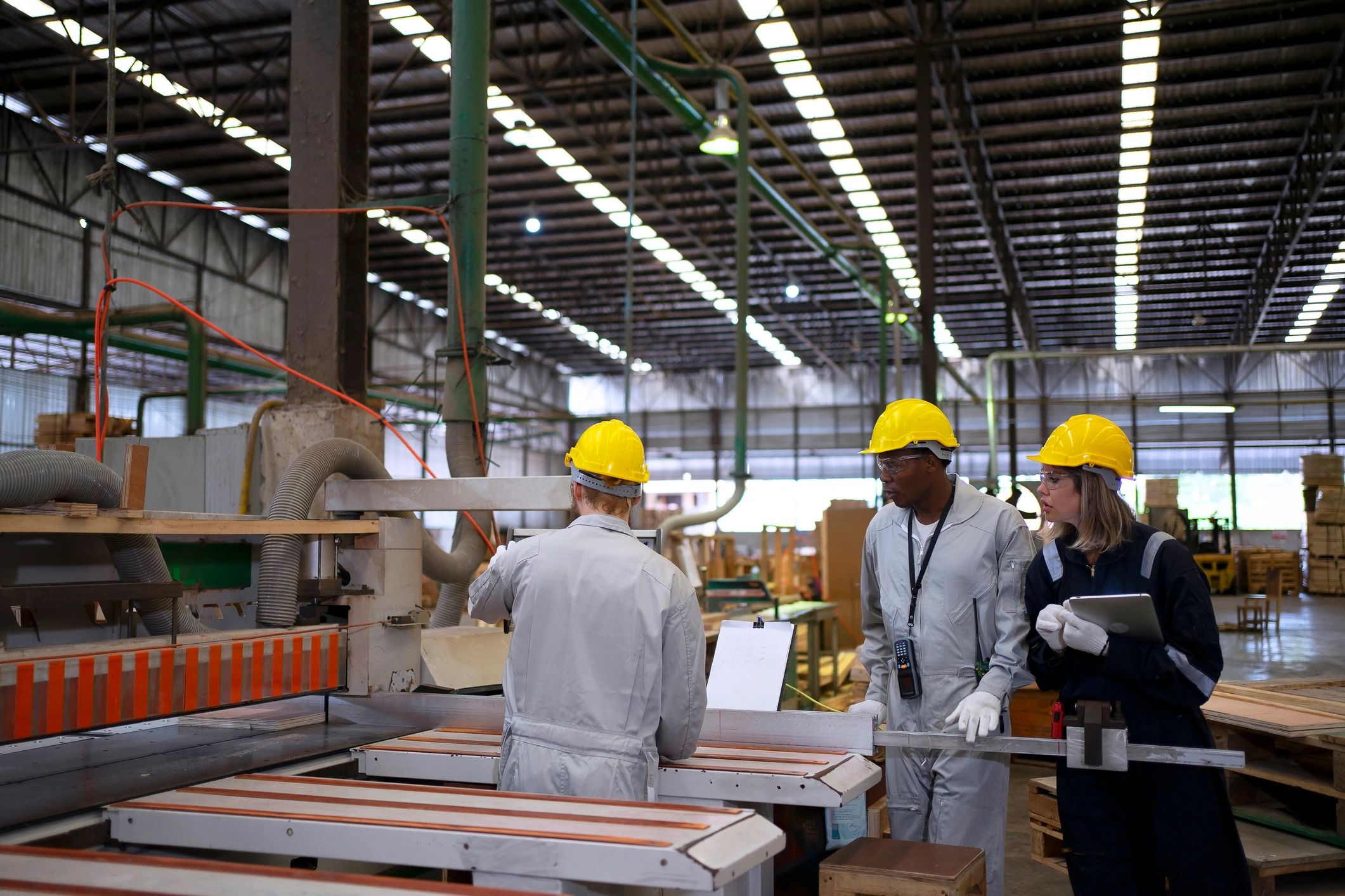 Production team preparing apparel for group orders