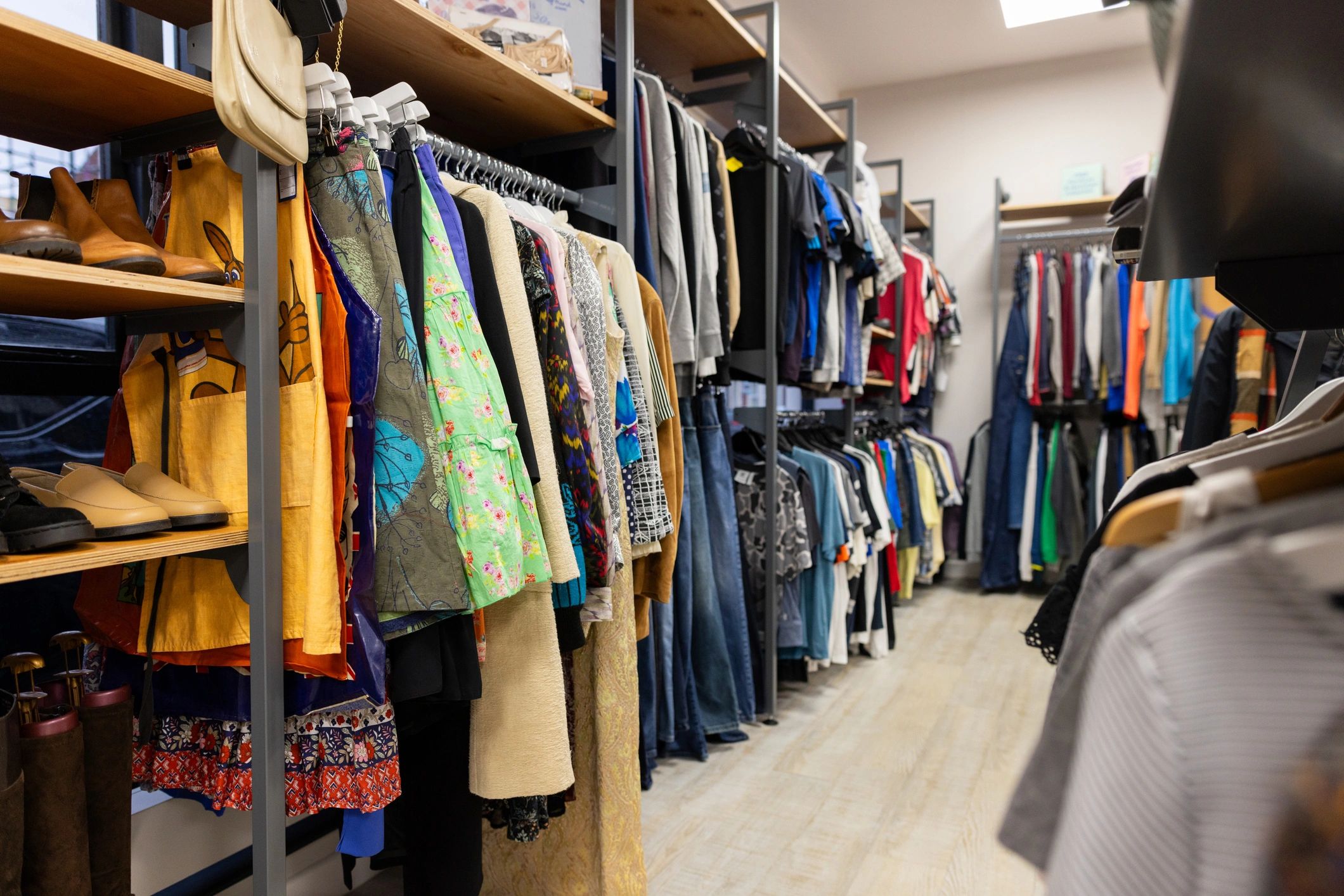Clothing racks representing business apparel options